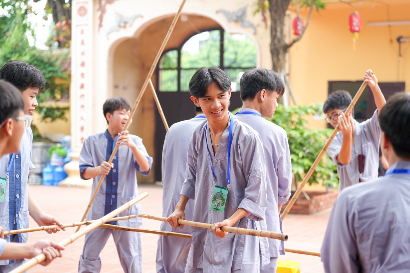 A group of boys holding sticks AI-generated content may be incorrect.