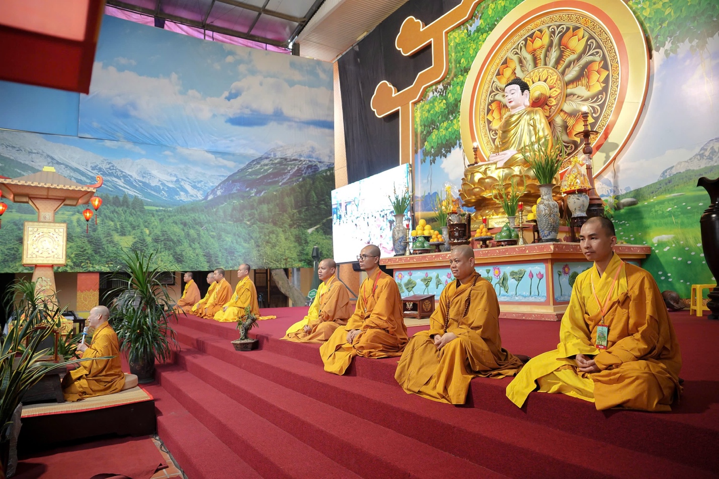A group of buddhist monks sitting on a stage AI-generated content may be incorrect.