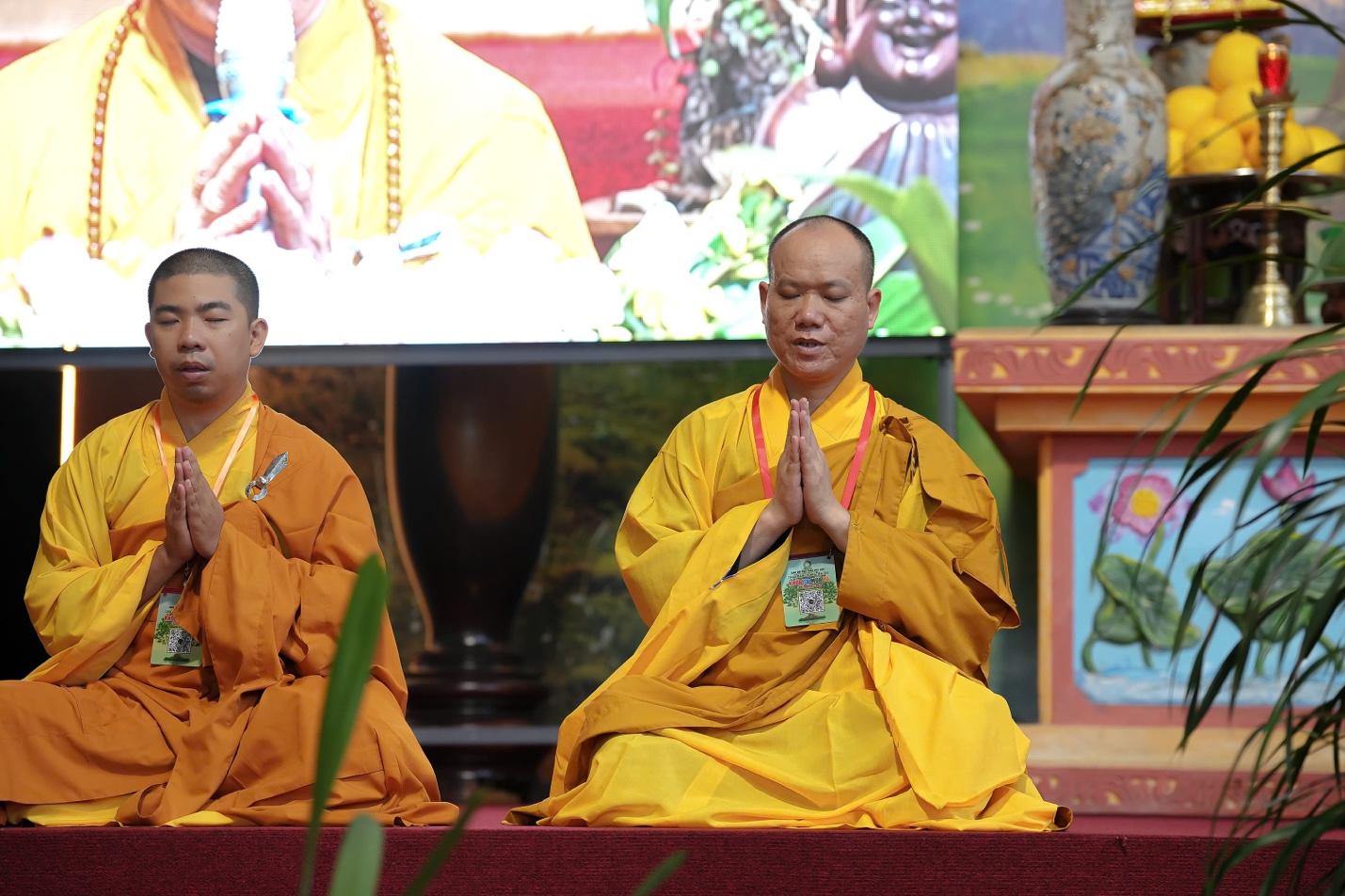 A group of men in yellow robes AI-generated content may be incorrect.