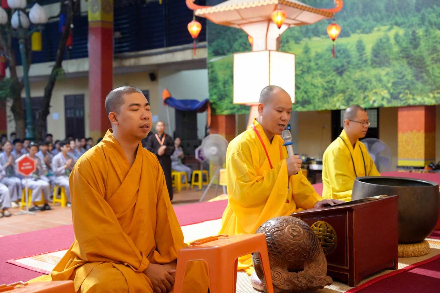 A group of men in yellow robes AI-generated content may be incorrect.