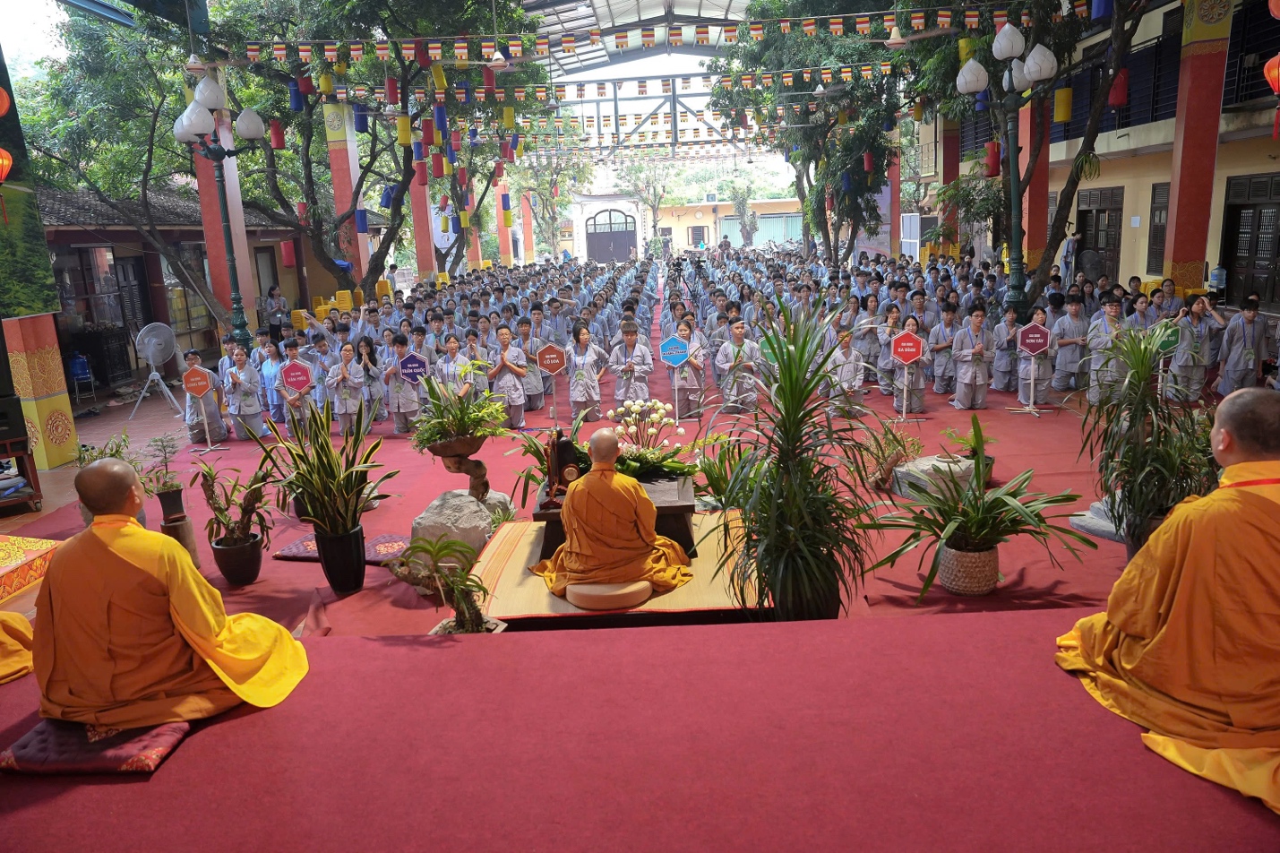A group of people in a ceremony AI-generated content may be incorrect.