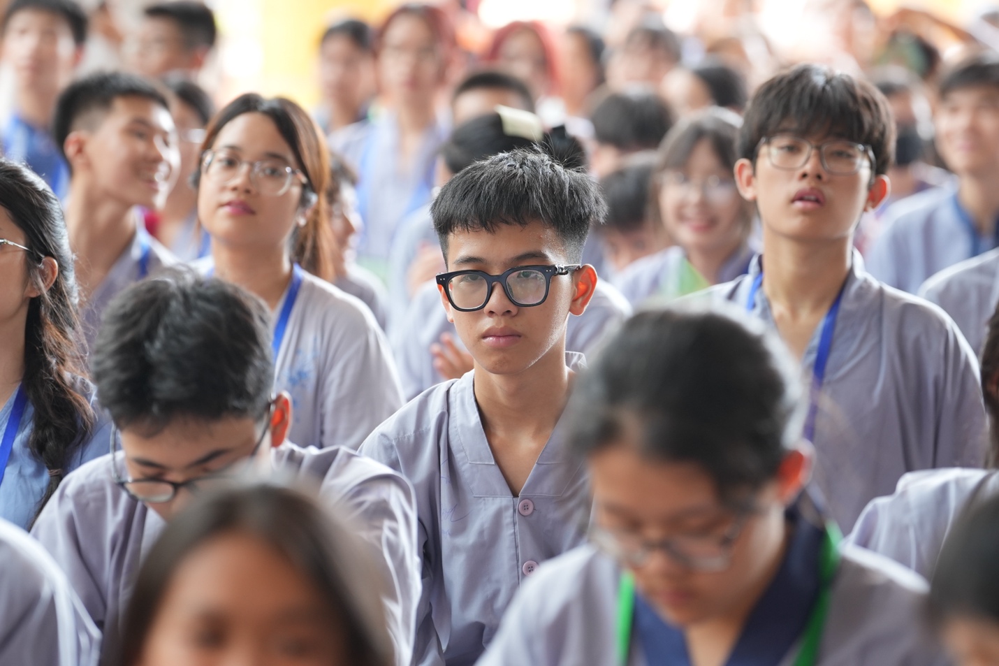 A group of people in a classroom AI-generated content may be incorrect.