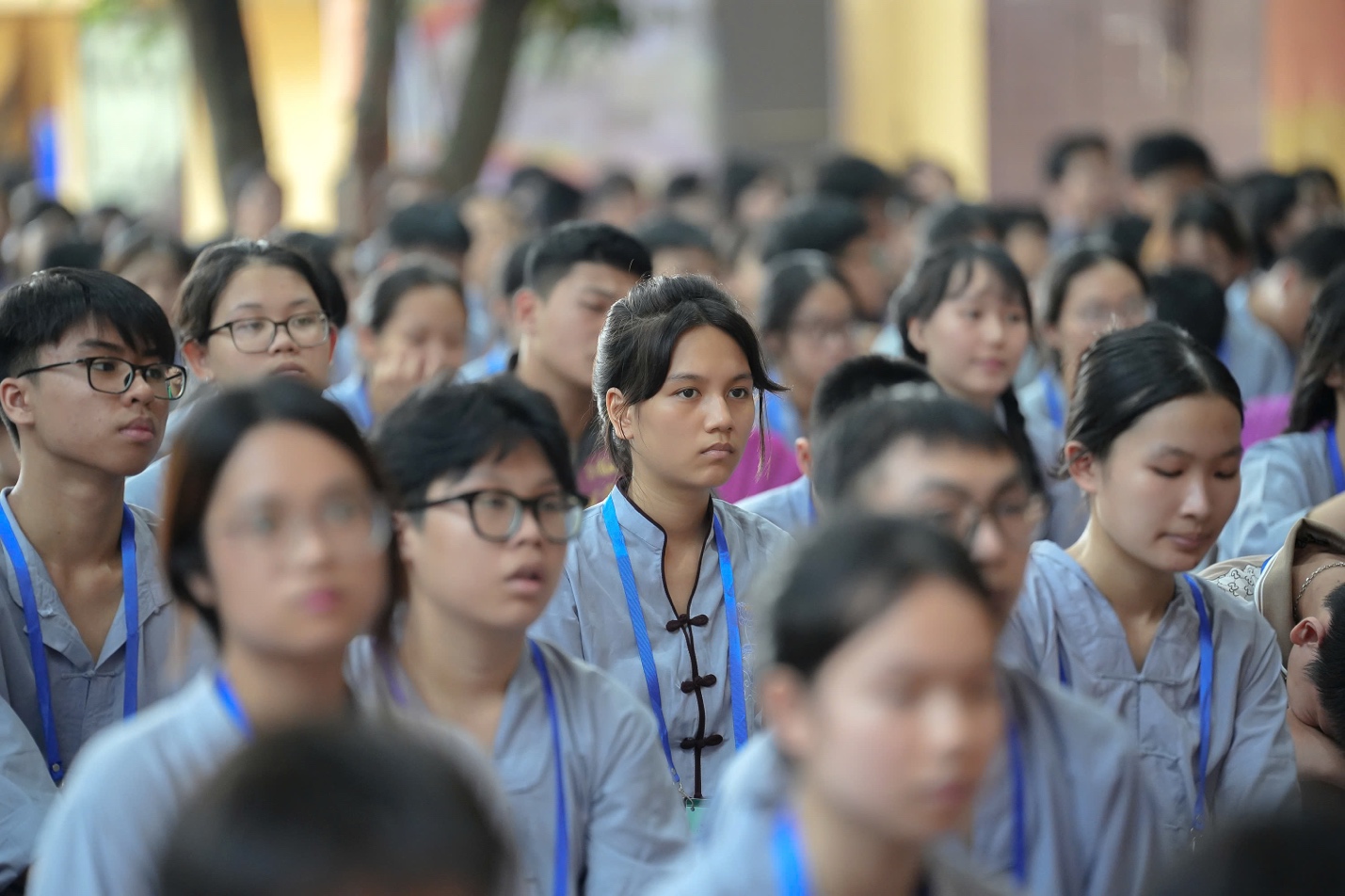 A group of people in a crowd AI-generated content may be incorrect.