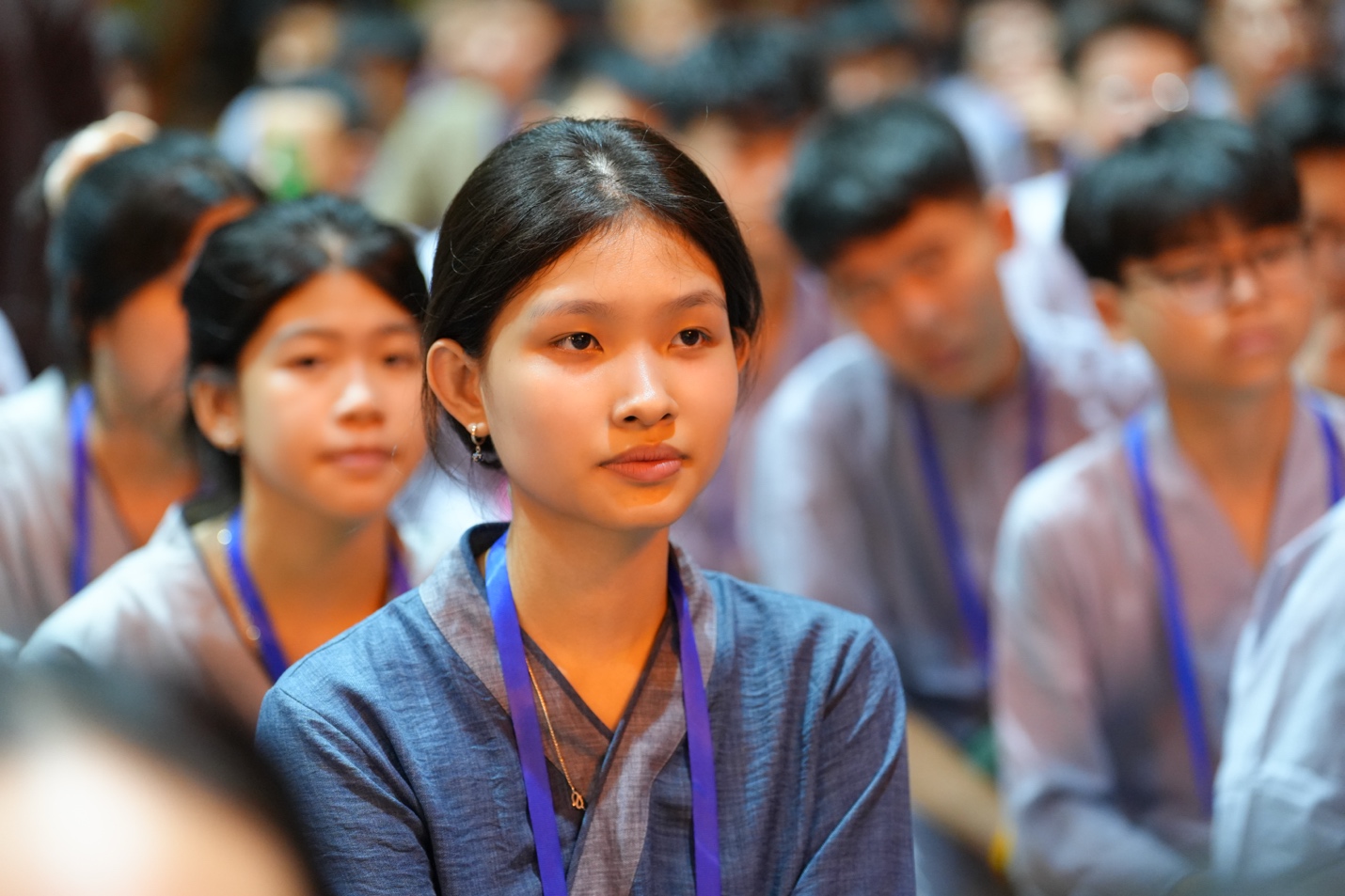 A group of people in a room AI-generated content may be incorrect.