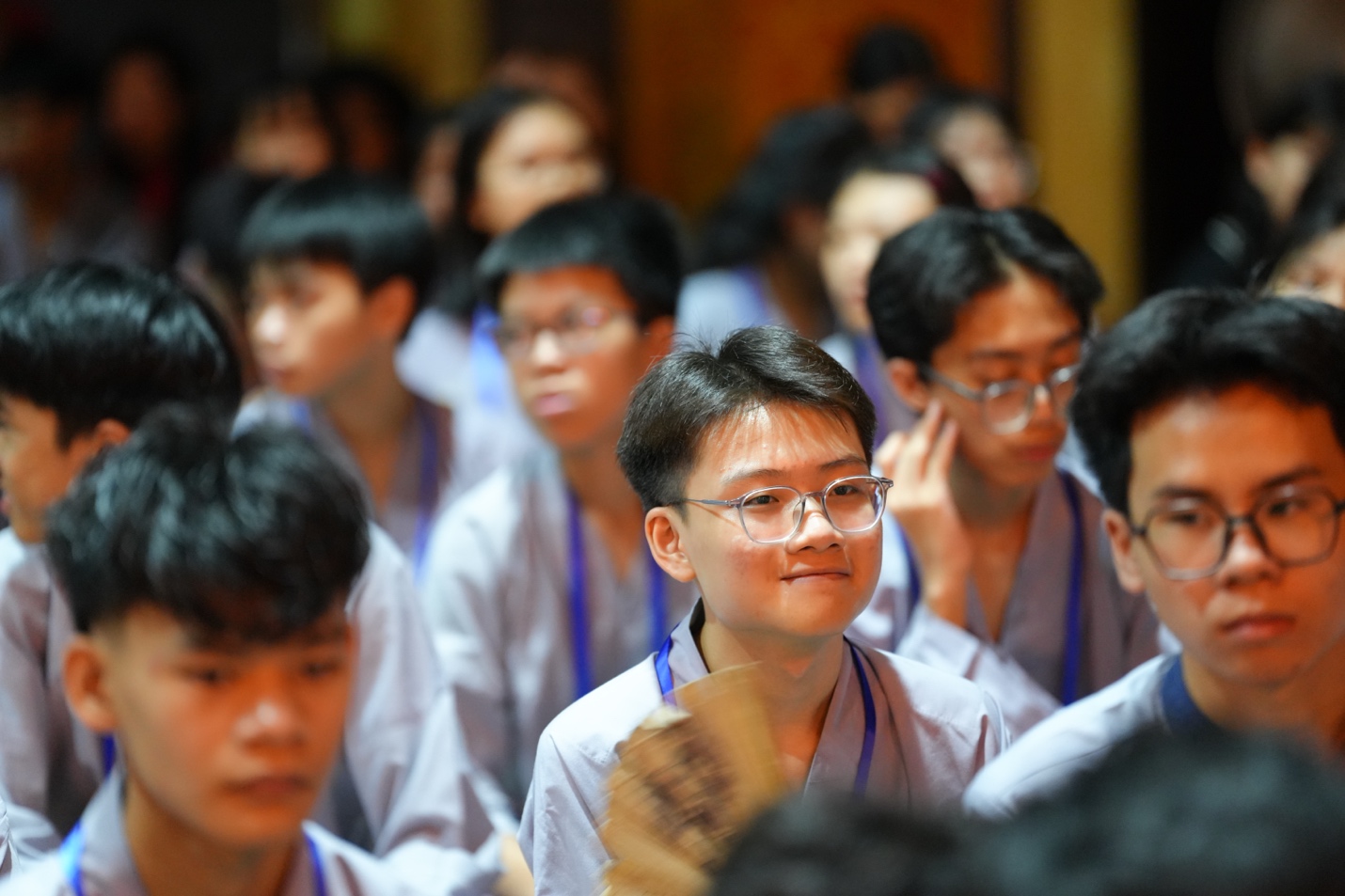 A group of people in a room AI-generated content may be incorrect.