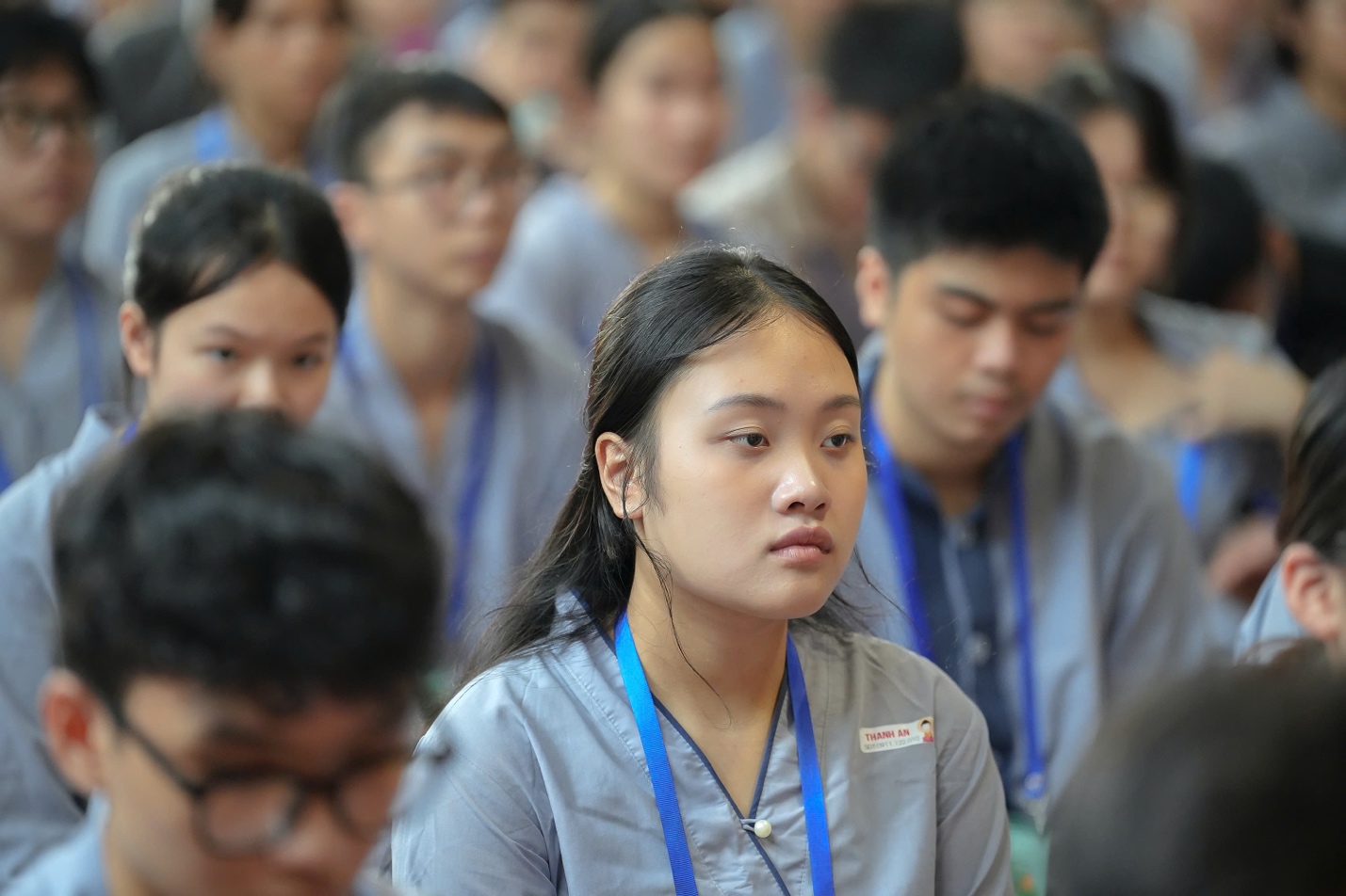 A group of people in a room AI-generated content may be incorrect.
