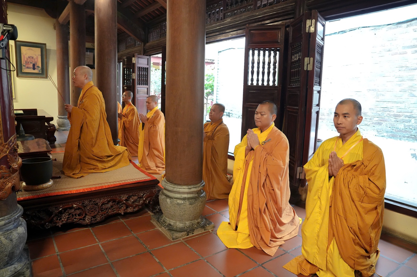 A group of people in robes AI-generated content may be incorrect.