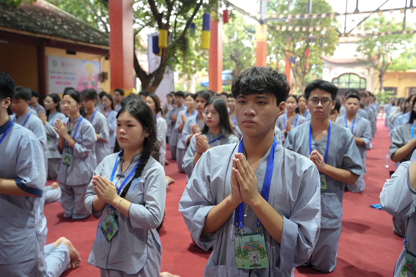 A group of people in robes praying AI-generated content may be incorrect.