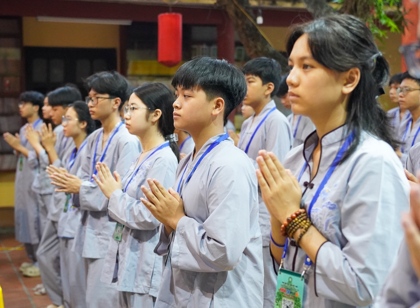 A group of people in white uniforms AI-generated content may be incorrect.