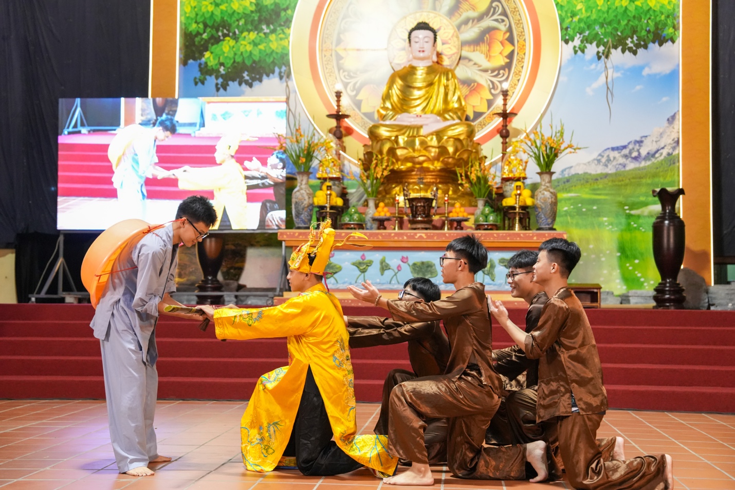 A group of people kneeling on a stage AI-generated content may be incorrect.