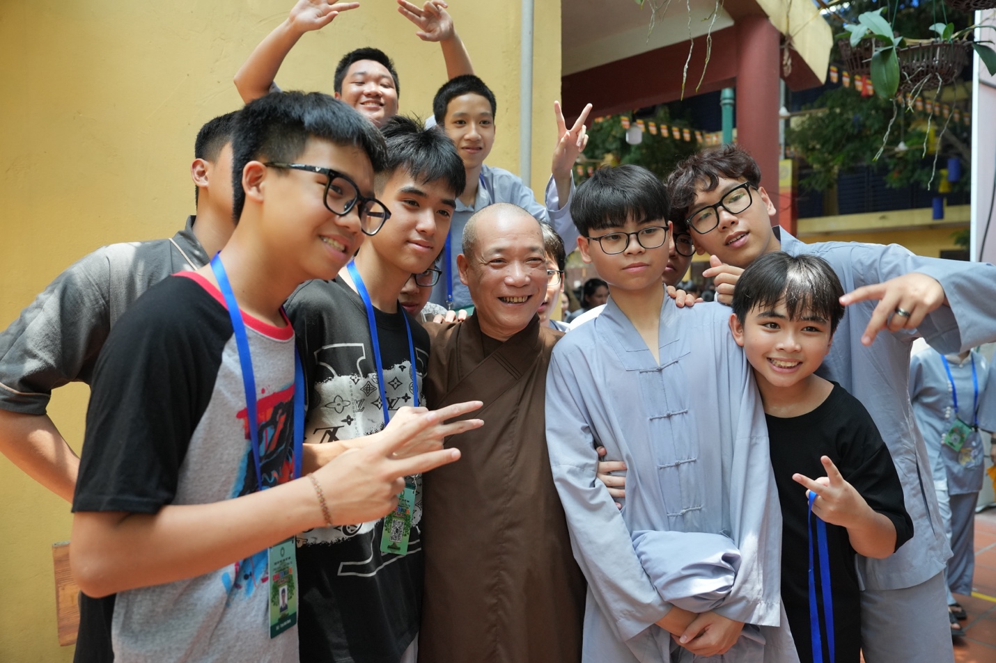 A group of people posing for a photo AI-generated content may be incorrect.