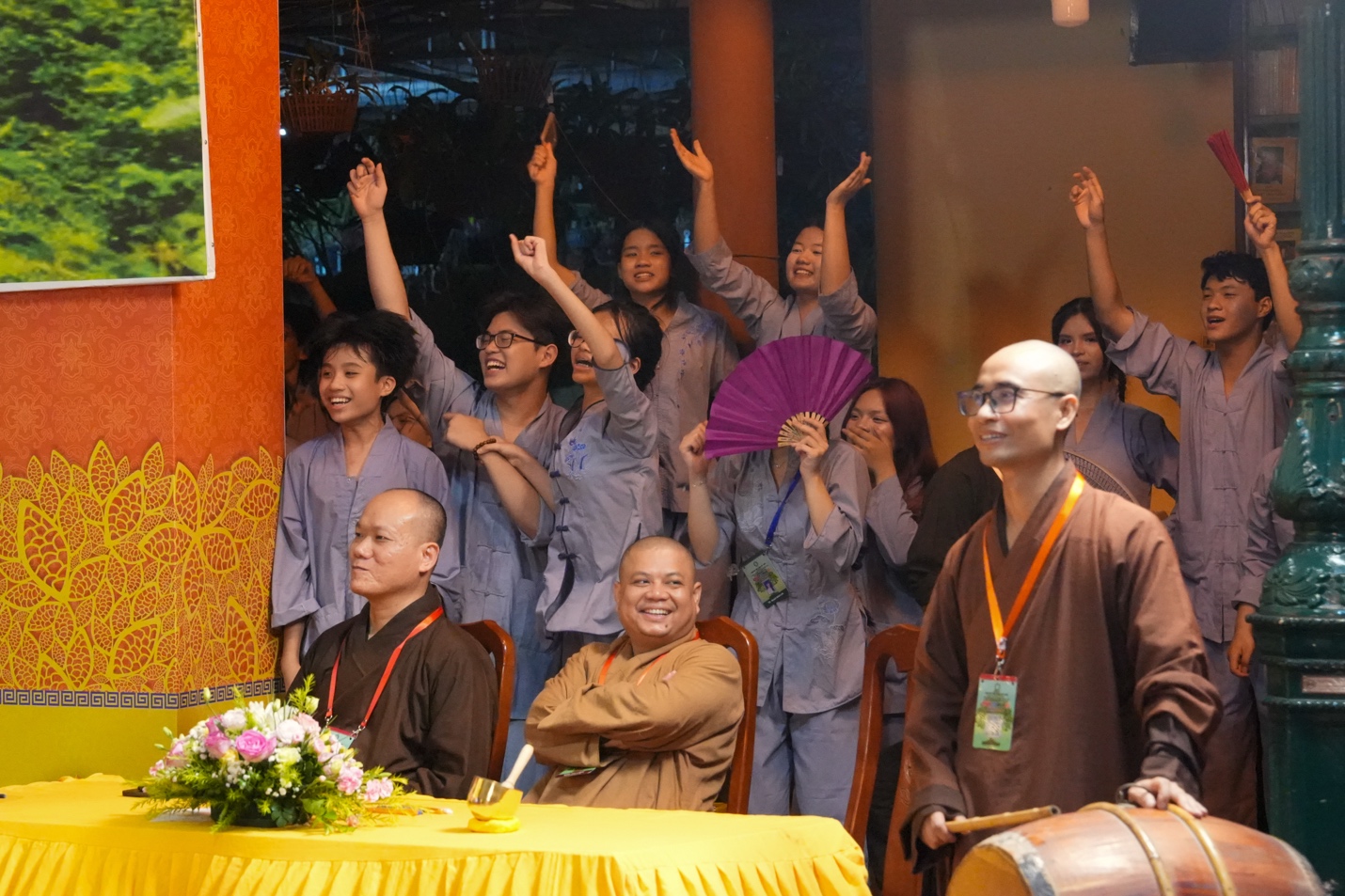 A group of people raising their hands AI-generated content may be incorrect.
