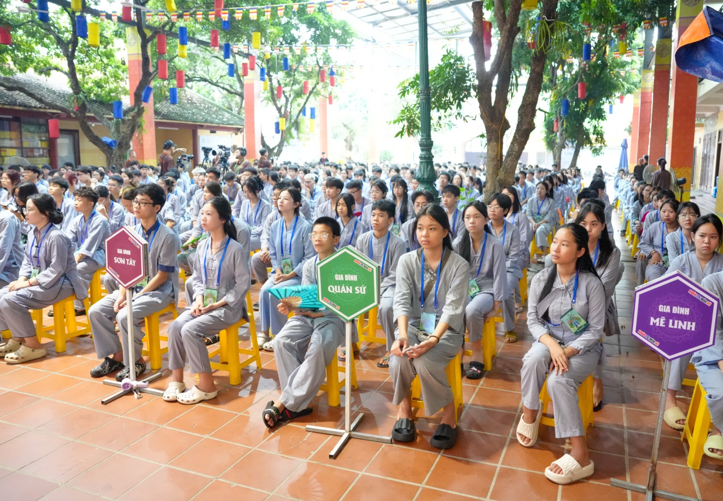 A group of people sitting in chairs AI-generated content may be incorrect.