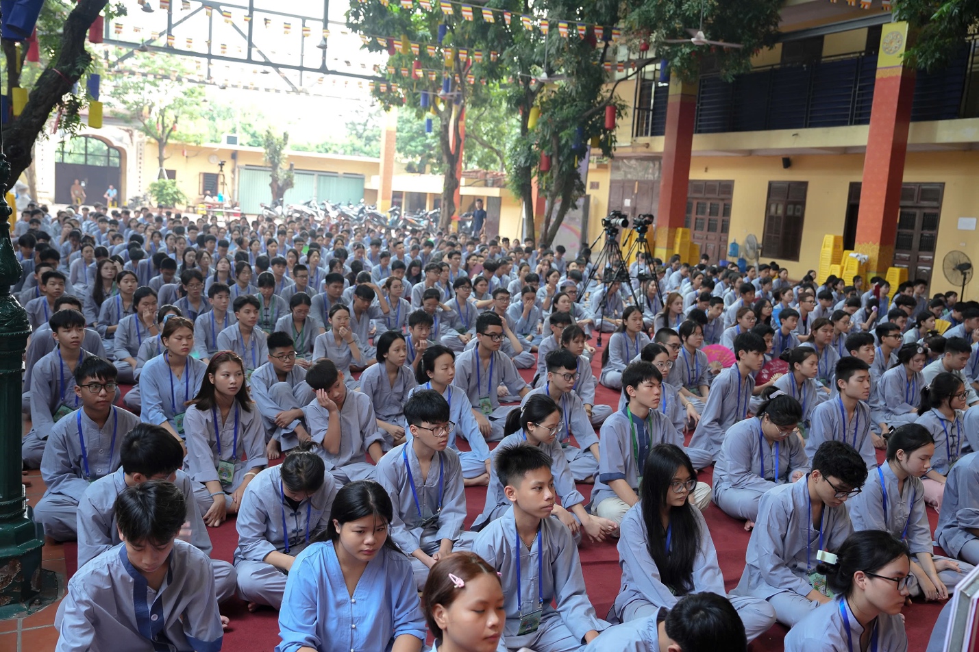 A group of people sitting on the floor AI-generated content may be incorrect.
