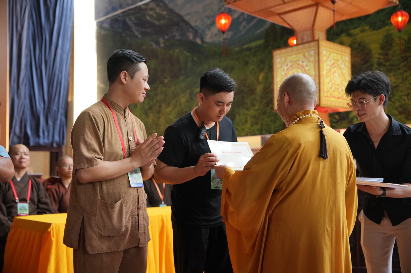 A group of people standing around a monk AI-generated content may be incorrect.