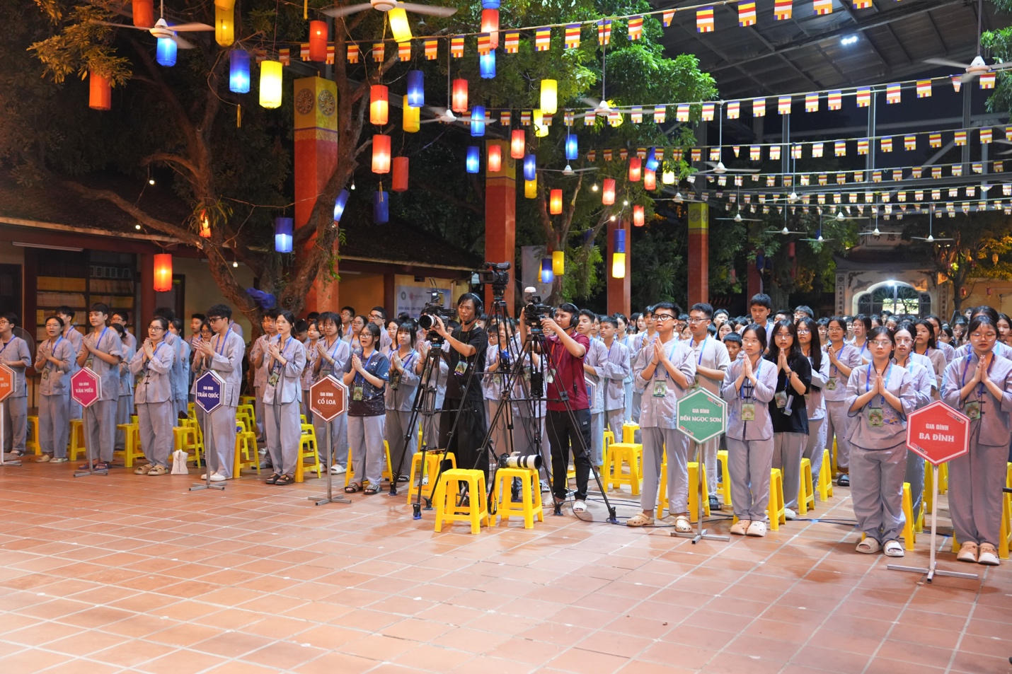 A group of people standing in a line AI-generated content may be incorrect.