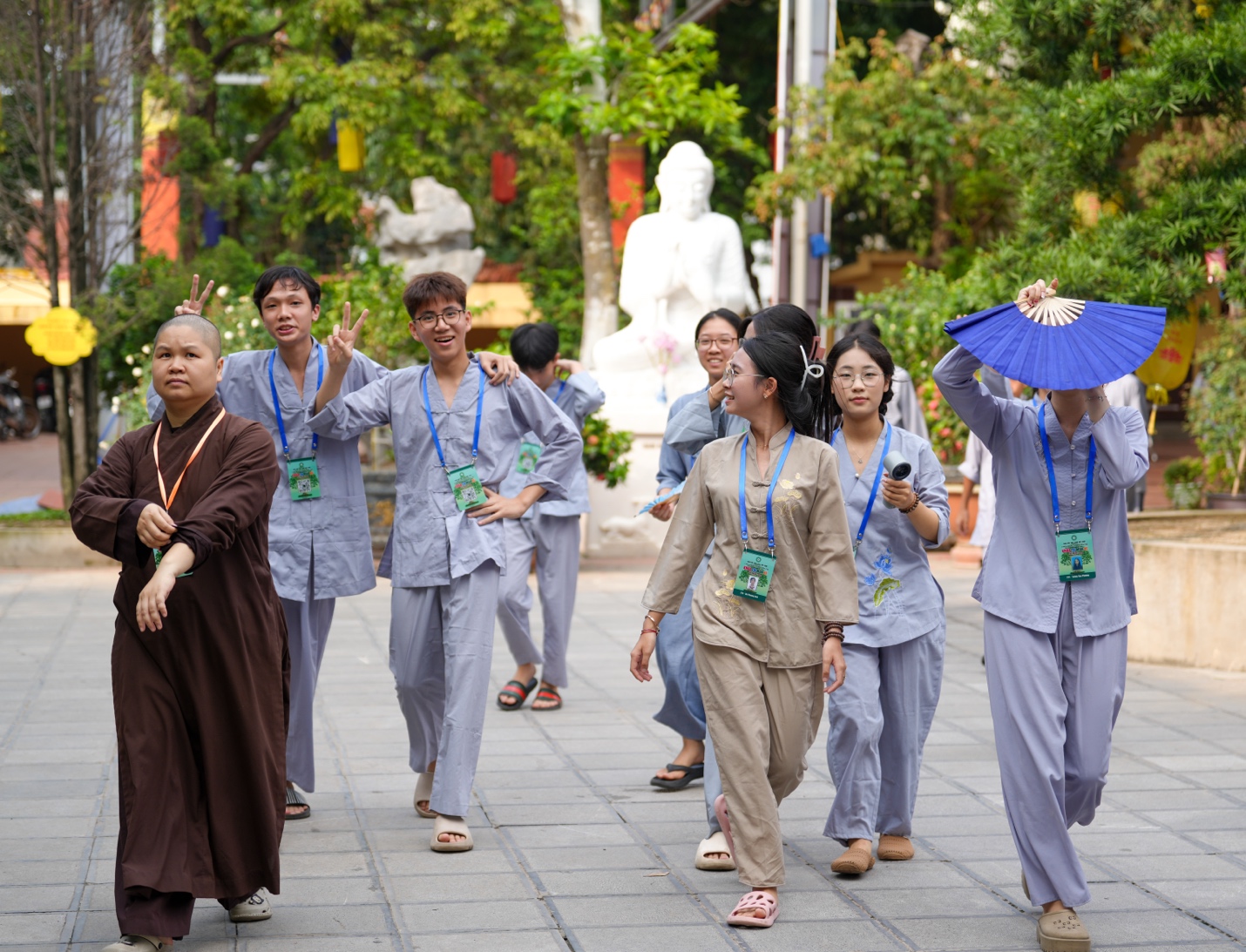 A group of people walking on a sidewalk AI-generated content may be incorrect.