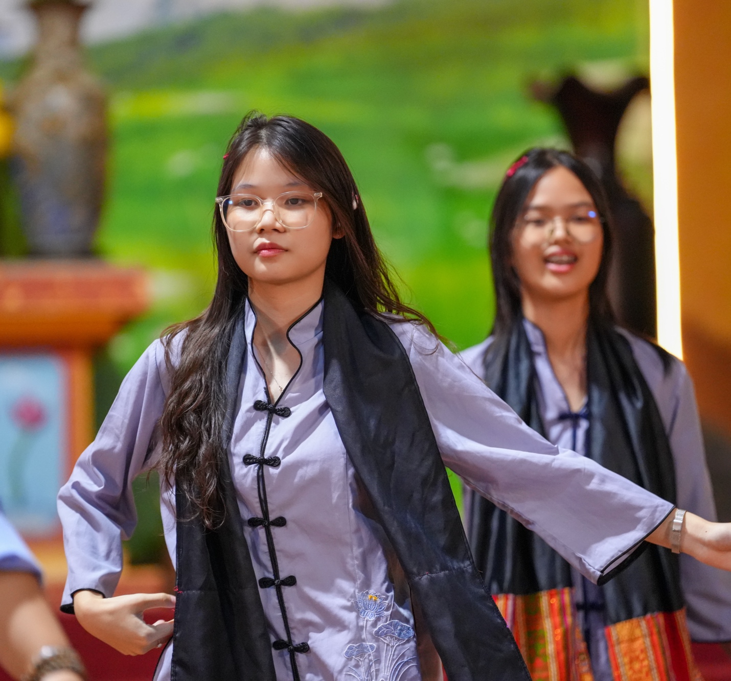 A group of women dancing AI-generated content may be incorrect.
