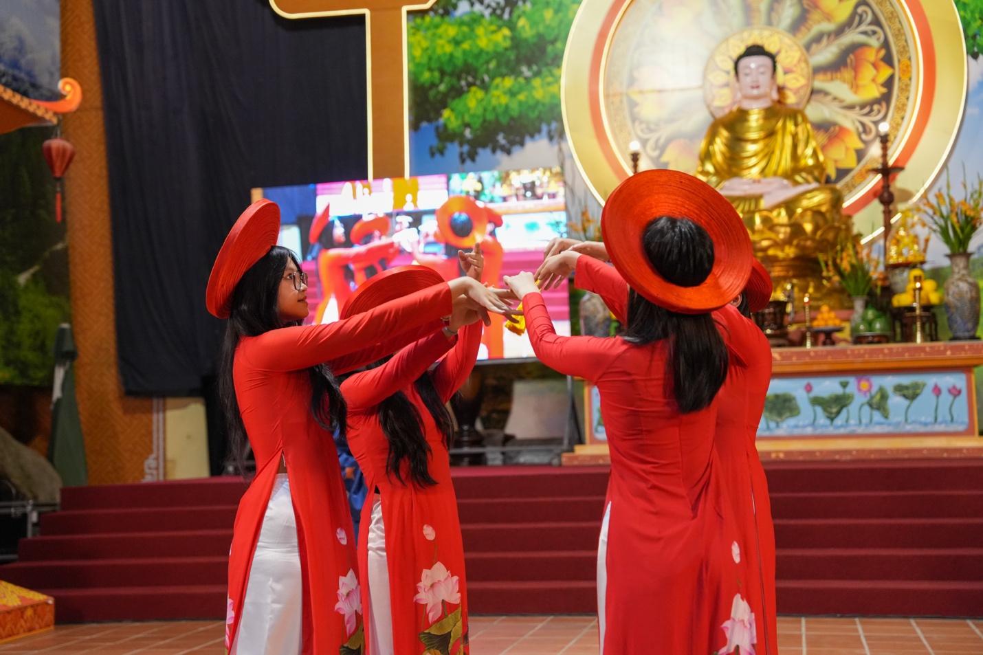 A group of women wearing red dresses and hats AI-generated content may be incorrect.