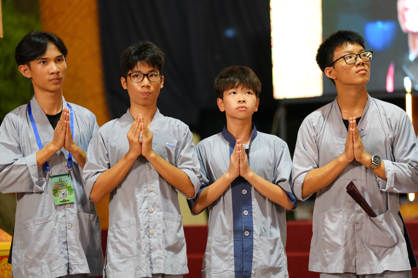 A group of young men in matching outfits AI-generated content may be incorrect.