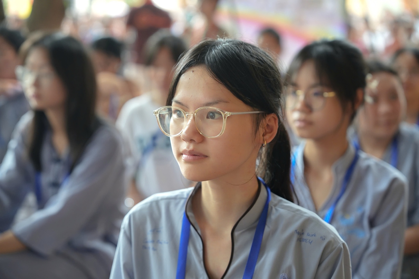 A group of young women in a classroom AI-generated content may be incorrect.