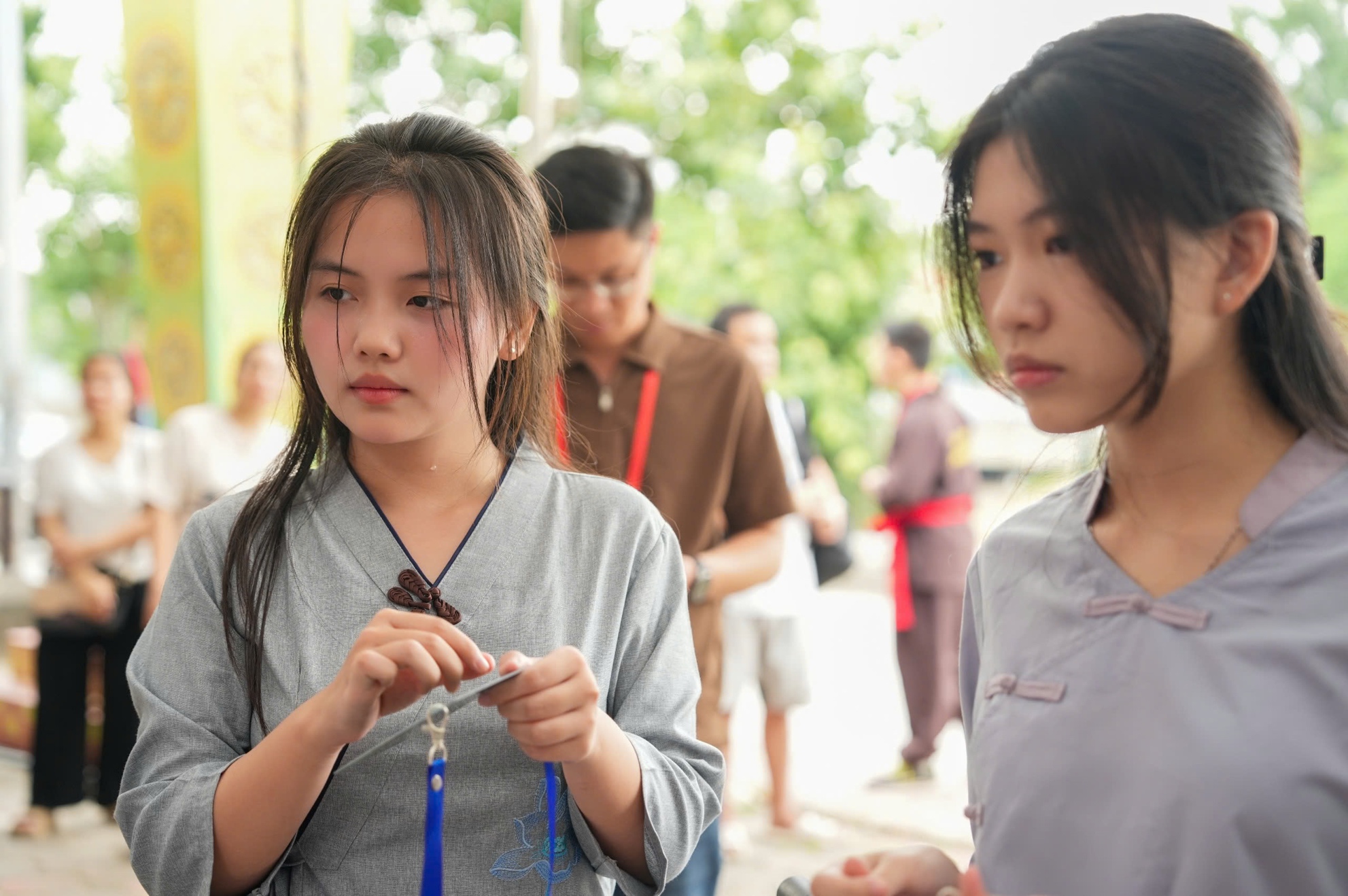 A group of young women standing in a line AI-generated content may be incorrect.