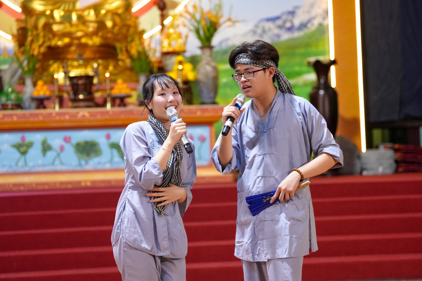A person and person holding microphones AI-generated content may be incorrect.