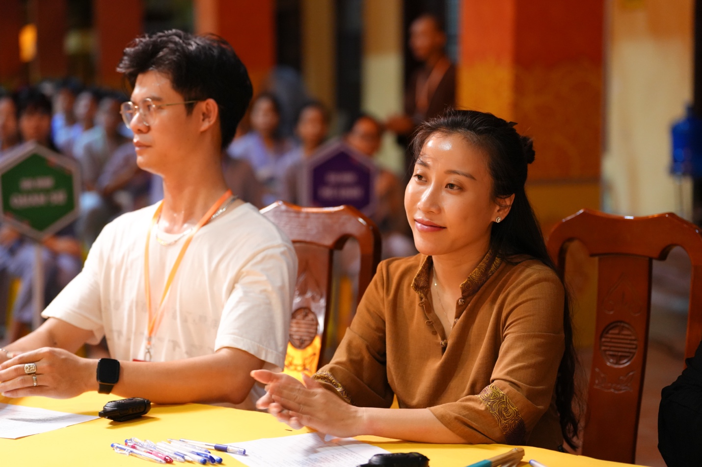 A person and person sitting at a table AI-generated content may be incorrect.
