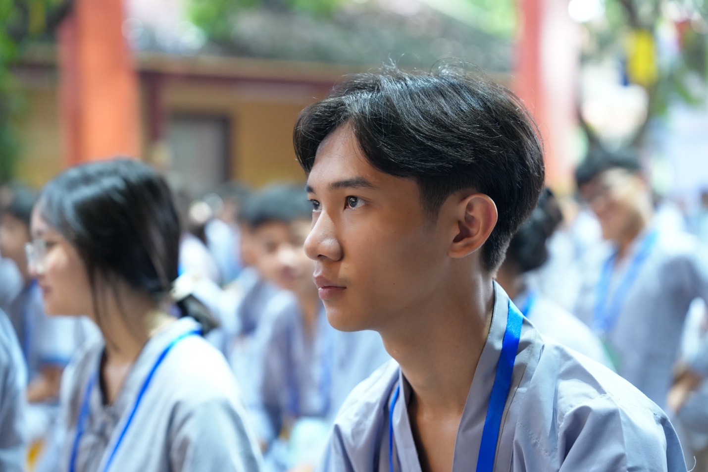 A person in a blue shirt AI-generated content may be incorrect.